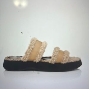 STAUD
Siesta faux shearling-lined vegan leather slides